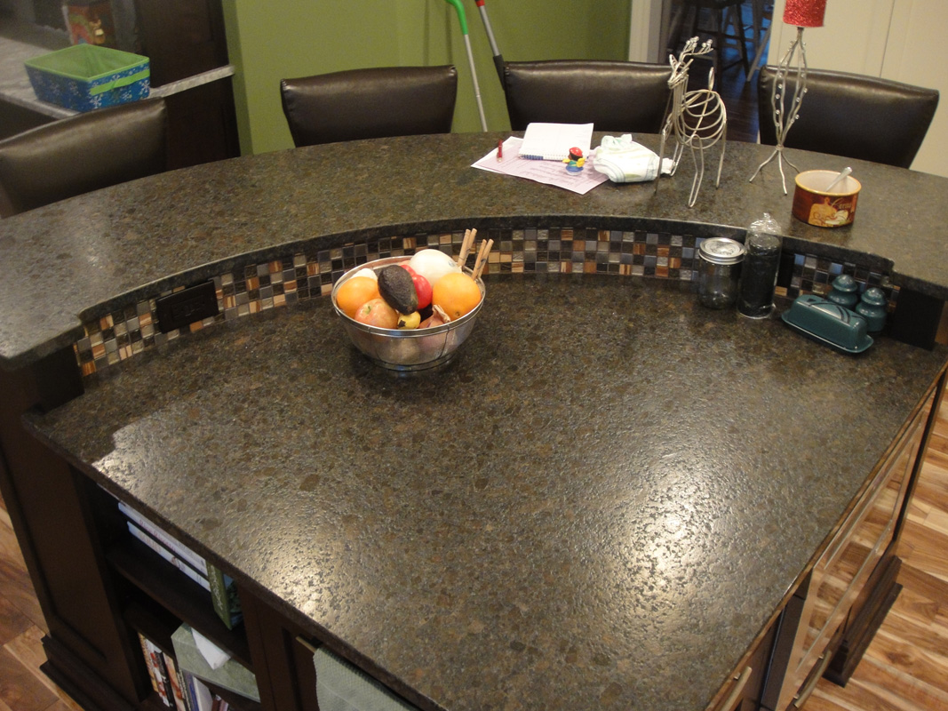 kitchen countertop with bowl of fruit on it